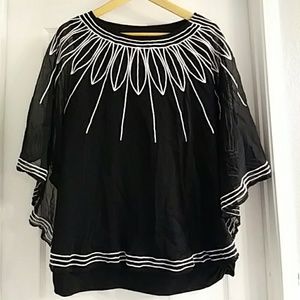 Sheer cape top